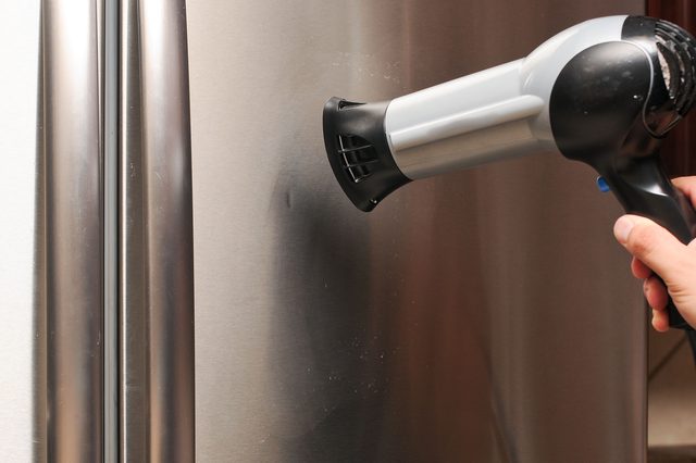 Как исправить вмятину на дверце холодильника